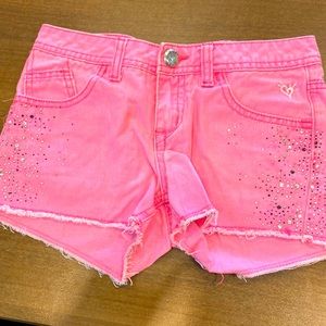 Light pink Justice cut off jean shorts size 10R.